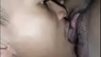 Spreading the pretty girl's pussy, using her tongue to lick her pussy before fucking her with his cock until he cums inside her pretty pussy and clit.