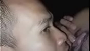 Spreading the pretty girl's pussy, using her tongue to lick her pussy before fucking her with his cock until he cums inside her pretty pussy and clit.