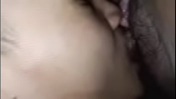 Spreading the pretty girl's pussy, using her tongue to lick her pussy before fucking her with his cock until he cums inside her pretty pussy and clit.