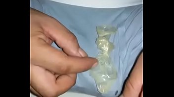 thumb jercking off in  used condom  