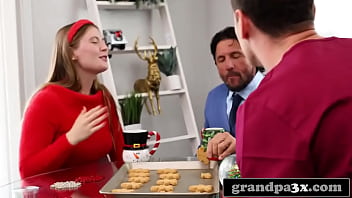 thumb grandpa dressed  as santa gives her a present   her a present her a present sh