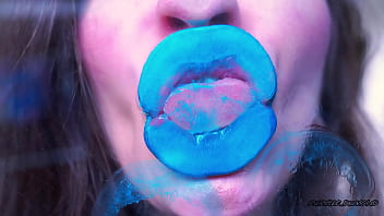 Wet red sticky lipgloss kiss