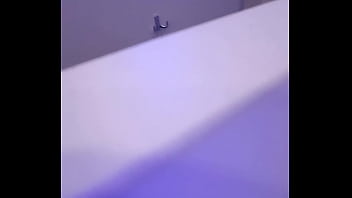 2 men having fun in a public toilet