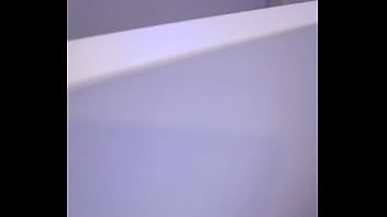2 men having fun in a public toilet