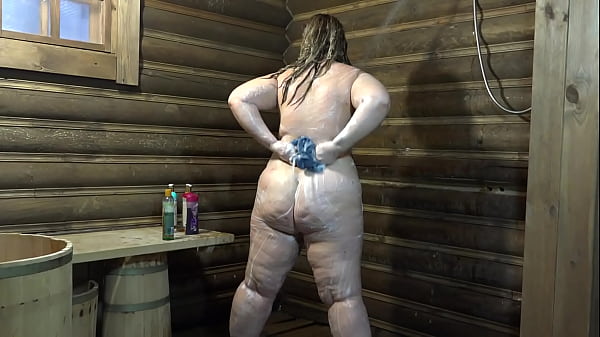 Mature BBW with a beautiful ass in the shower fucks her hairy pussy with a big bottle of shampoo and shows her gaping hole Home fetish