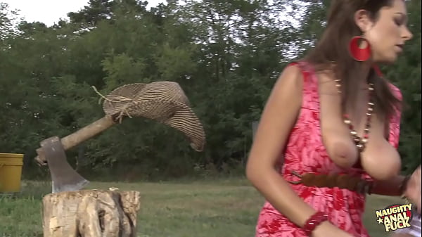 An extremely beautiful girl approached this man after chopping wood to get some hard wood