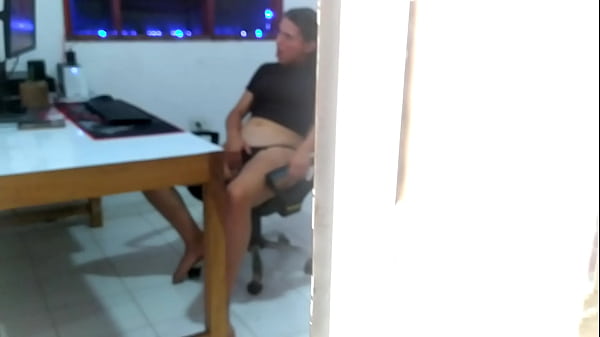 Catching my young neighbor through the window. My neighbor has just turned 18 and I discovered her masturbating while she watches porn on her computer. She watches video of threesomes being half-naked while she touches her pussy.