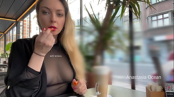 Flashing tits in cafe with glass walls so all people outside see me. Transparent t-shirt no bra.