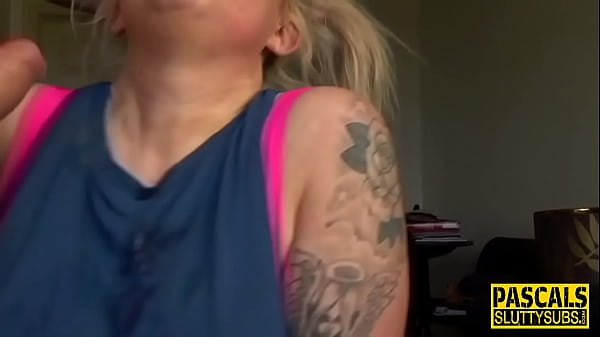 Submissive whore gagging on cock