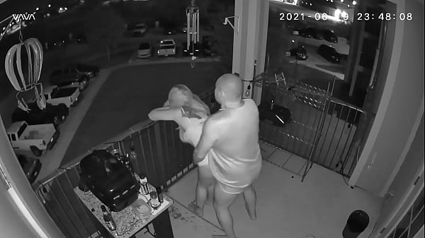 Couple caught on the balcony