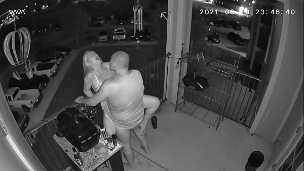 Couple caught on the balcony