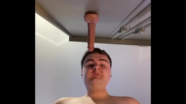 Gay 22 year old smooth chubby cub boy sucks and deepthroats his dildo sloppily, covering his face and chin in spit