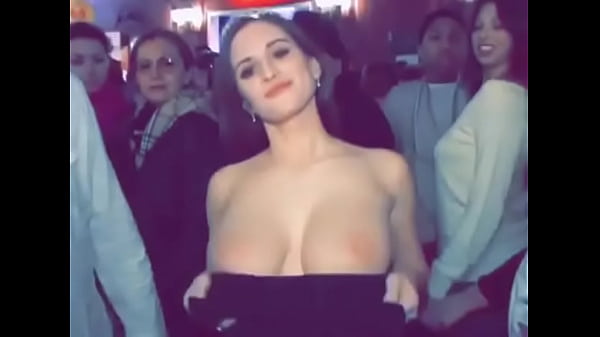 Pretty girl in dress flashes tits