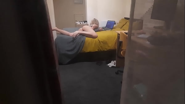 Girl caught masturbating through the window