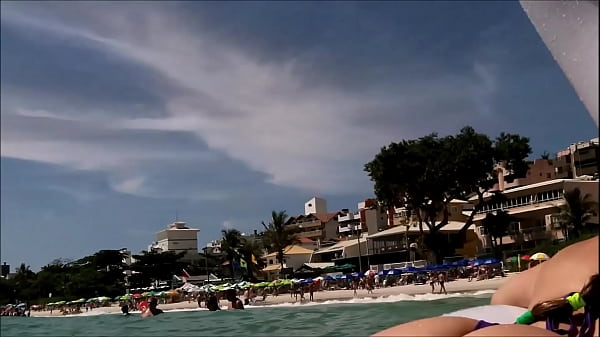 my husband, my unicorn and me in erotic play on a public beach