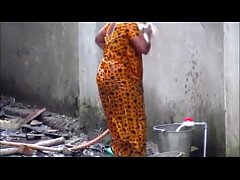  - indian couple bathing out side