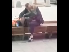  - Stupid blonde gives blowjob in public