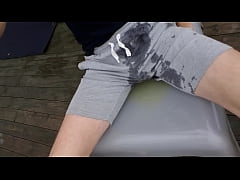  - Pissing in bermuda shorts outside hotel